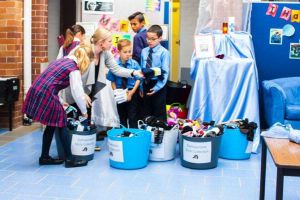 St Andrews Catholic Primary School Malabar - students sorting items into containers