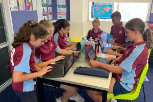 St Andrews Catholic Primary School Malabar - students doing school work in their laptops